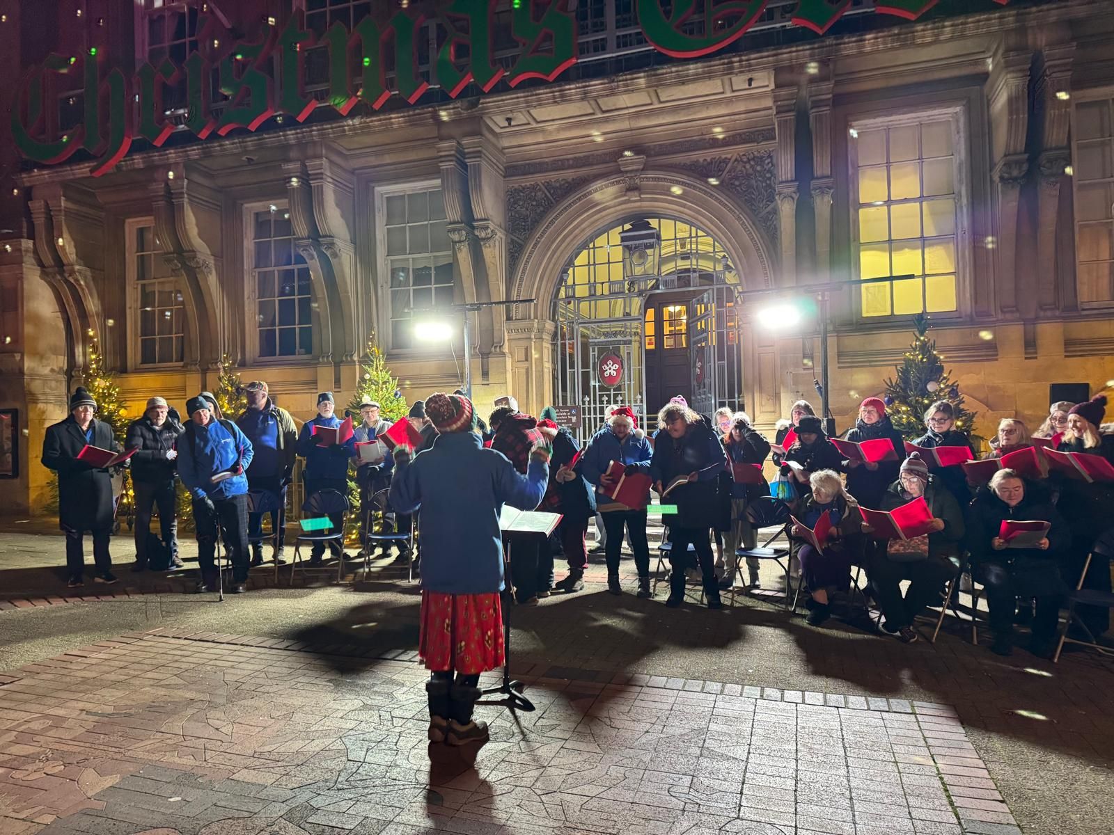 The choir performing at Light up Leicester