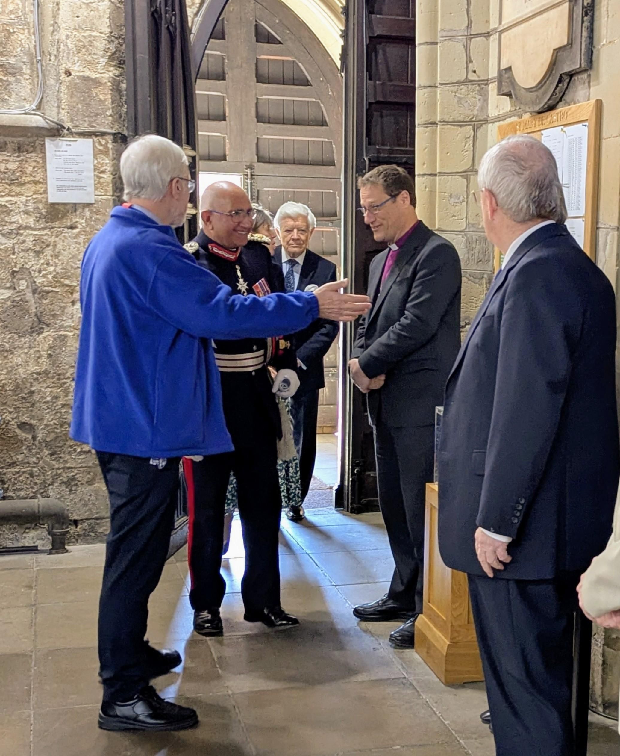 Rev'd Tony Leighton greeting guests at the award presentation